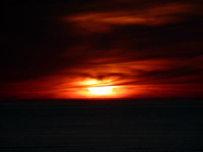 Œuvre de Yoyo: Soleil à l'horizon